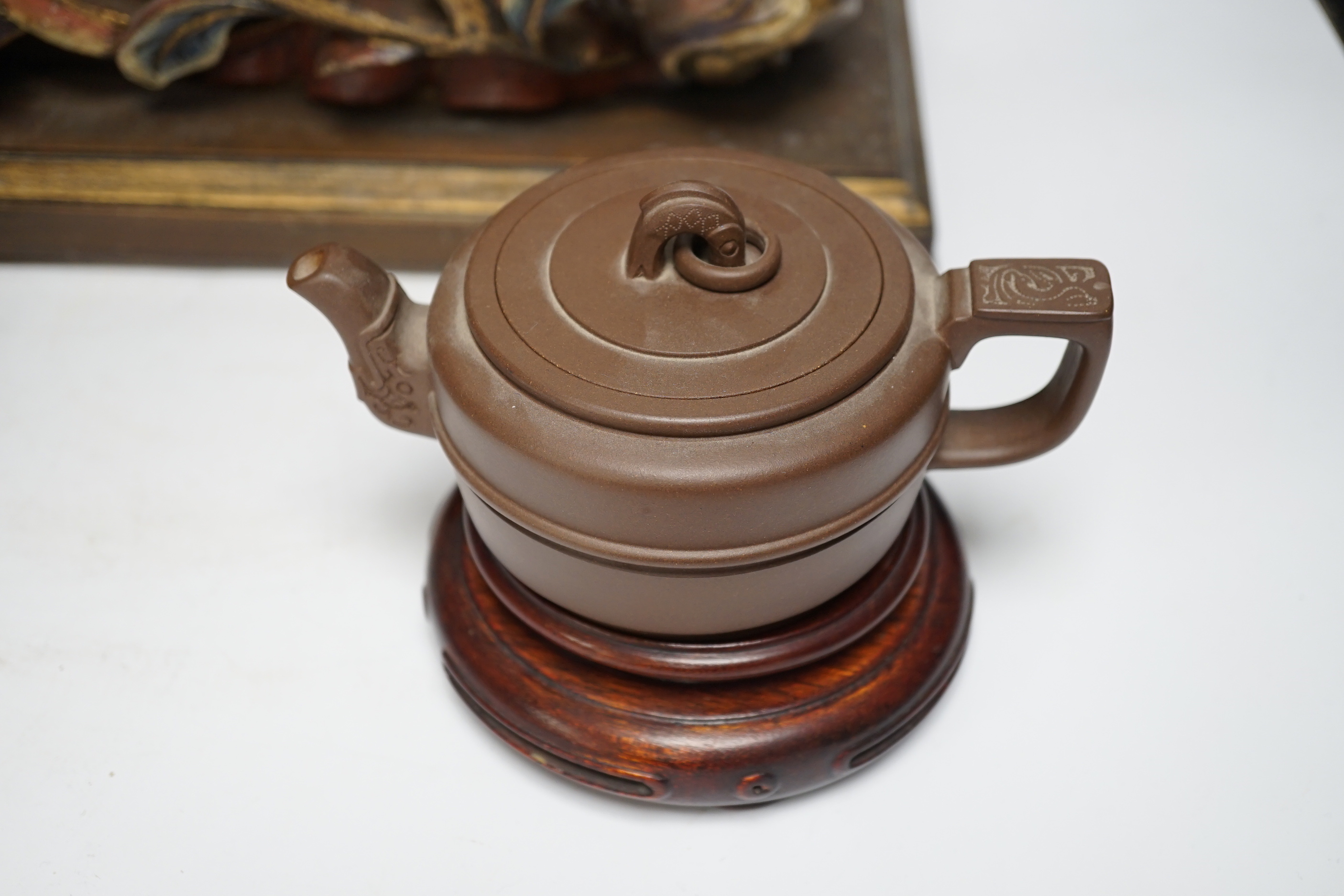 A Chinese floral wooden carving, 40cm wide, together with a Chinese cloisonné enamel vase and cover, 25cm tall, and a Chinese Yixing redware teapot